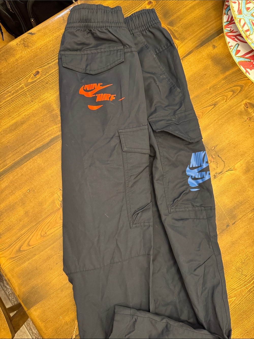 Nike Black Cargo Pants with Red and Blue Logos NWT